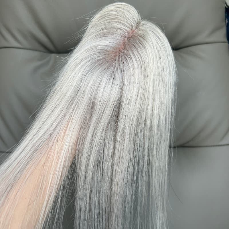 Silver grey human hair topper, natural part view