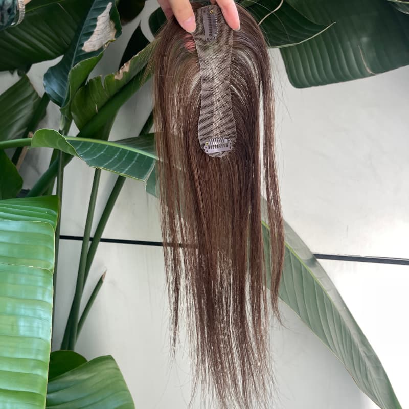 Brown human hair topper showing crown coverage