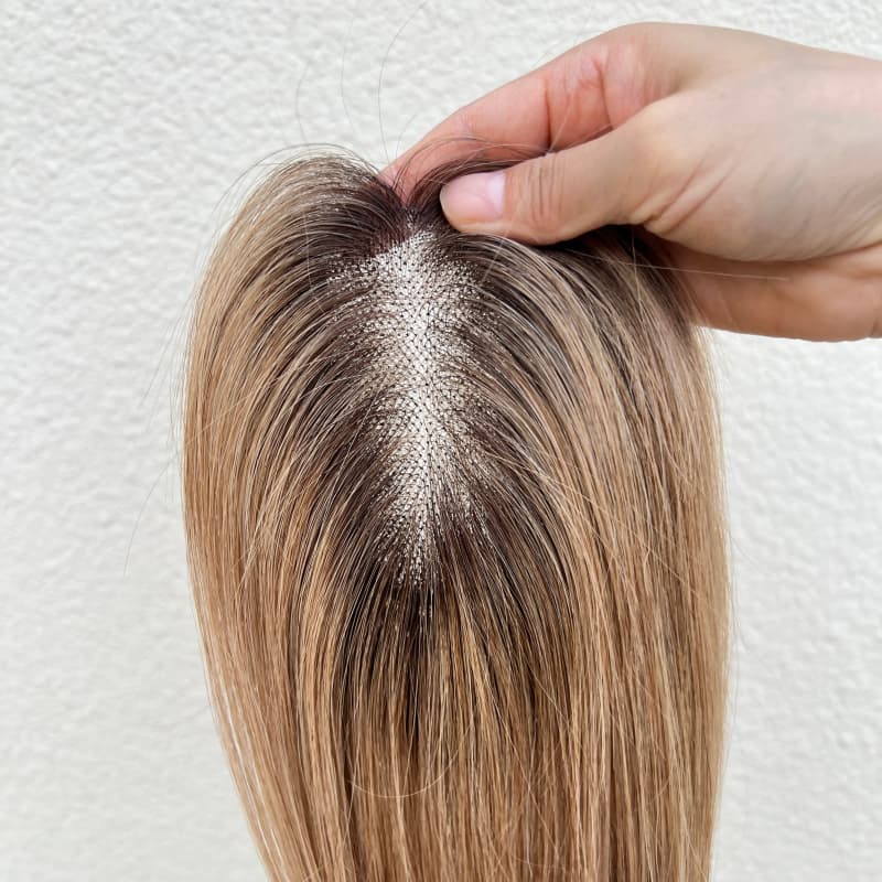 Brown gradient topper with natural-looking part