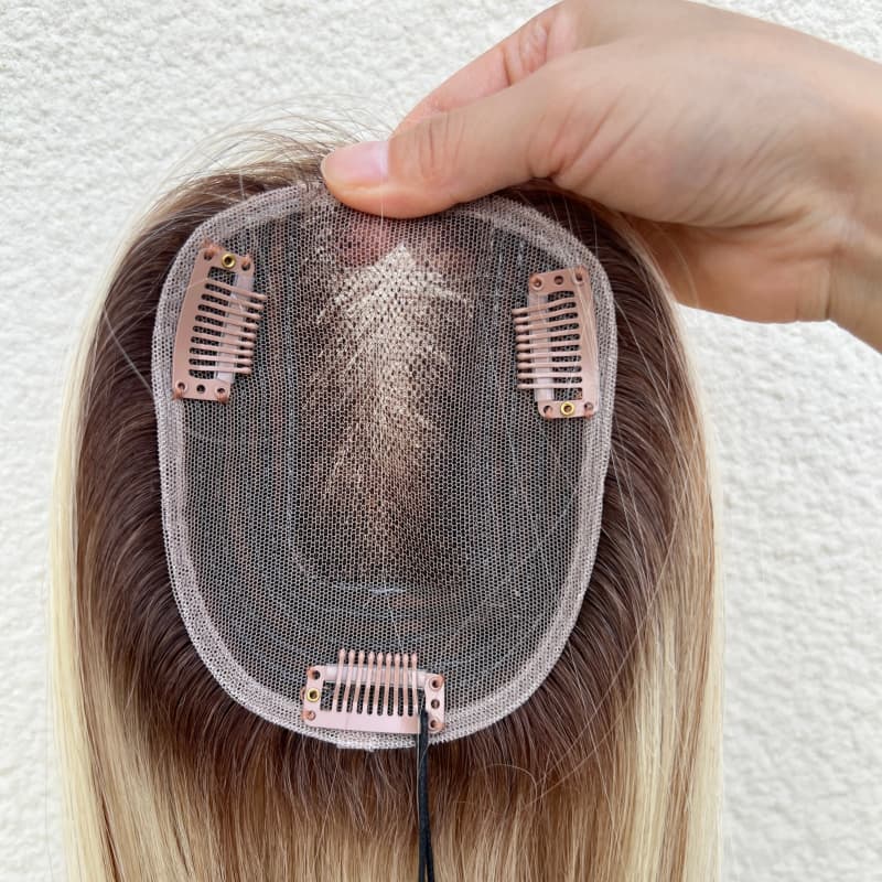 Lightweight clip-in human hair topper with gold highlights