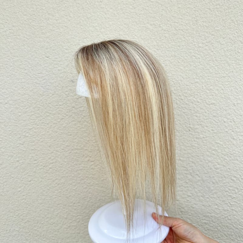 Back of golden gradient lace topper with clip attachments