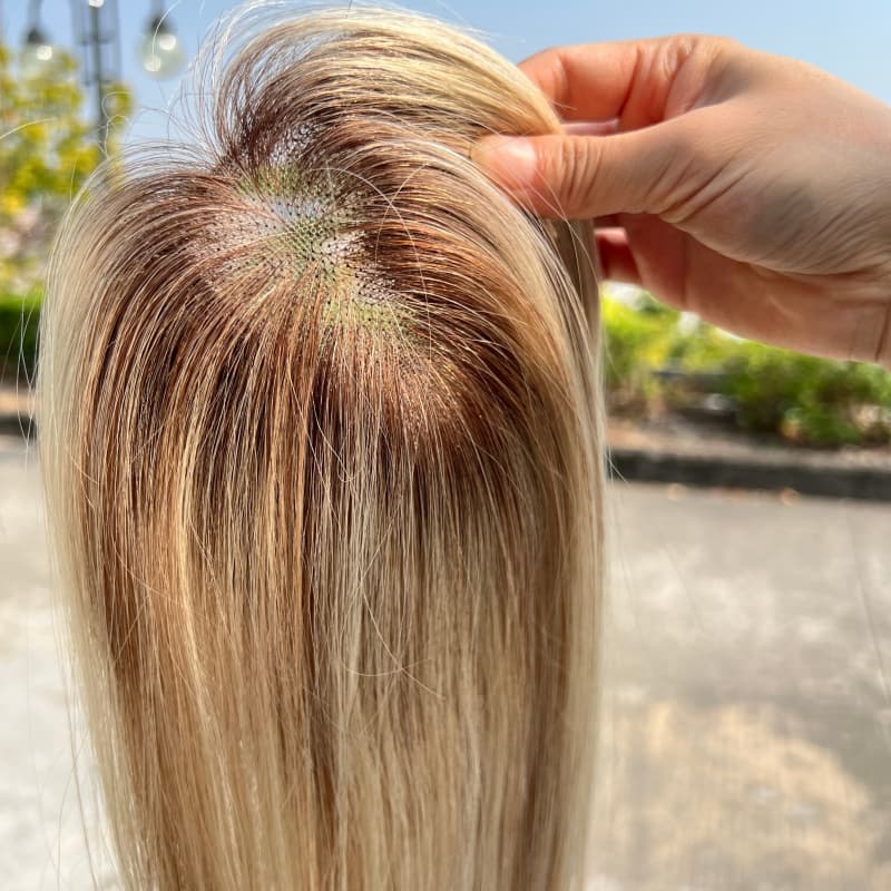 Golden gradient human hair topper with highlights, front view