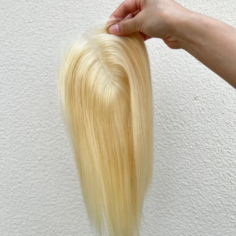 613 blonde human hair topper front view
