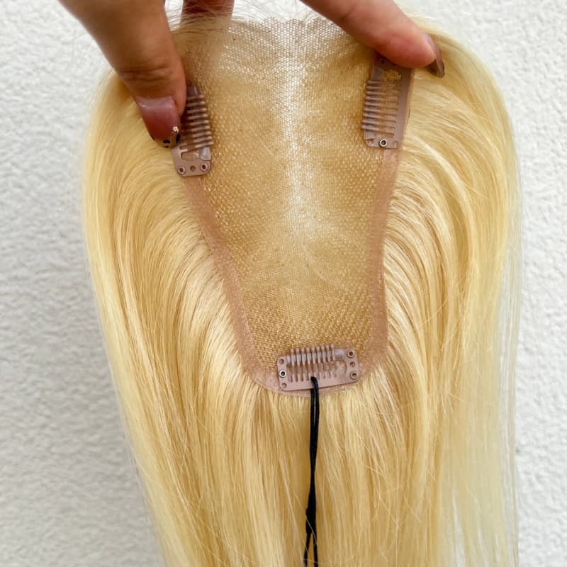 Back of large U-shaped lace topper base with clips