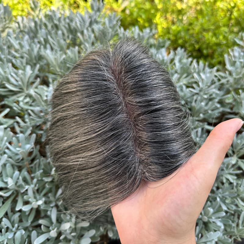 Underside of silver gray topper showing elongated mono base and clips