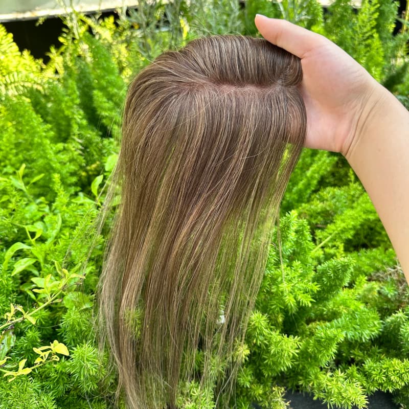 Brown highlighted human hair topper with natural-looking part