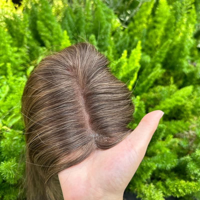 Brown highlight mono topper viewed from the crown