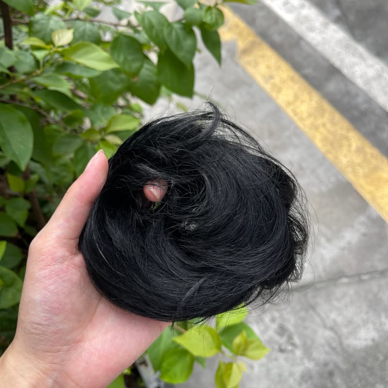 100% human hair bun scrunchie, color 1#, outdoor natural-light photo 5