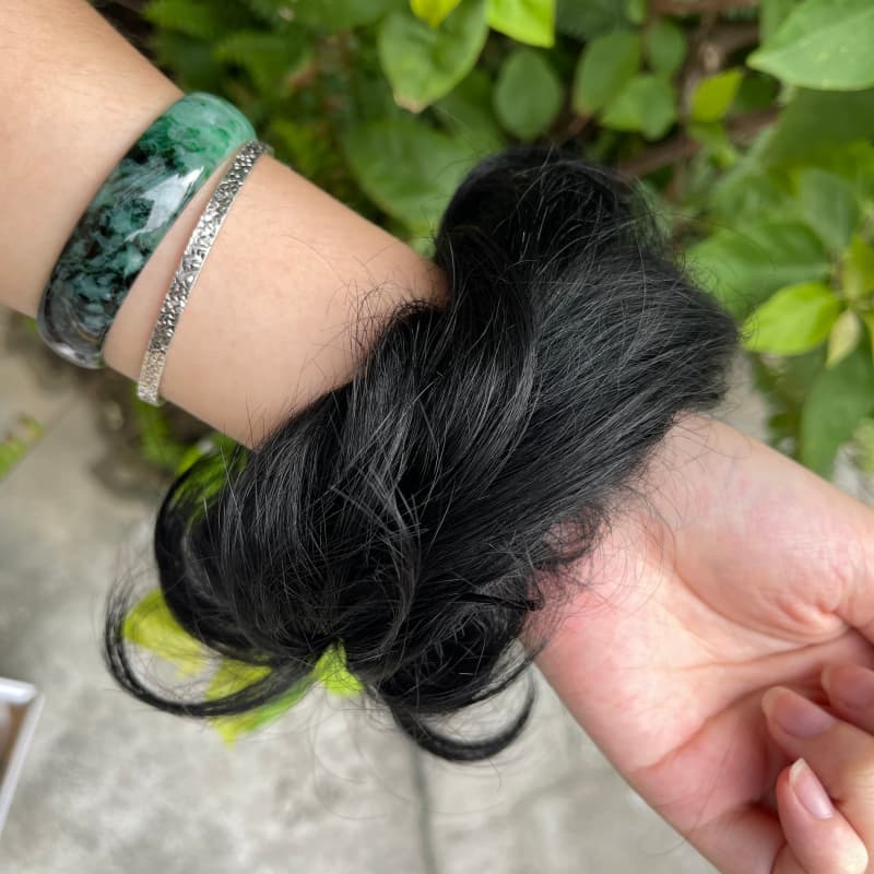 100% human hair bun scrunchie, color 1#, outdoor natural-light photo 6