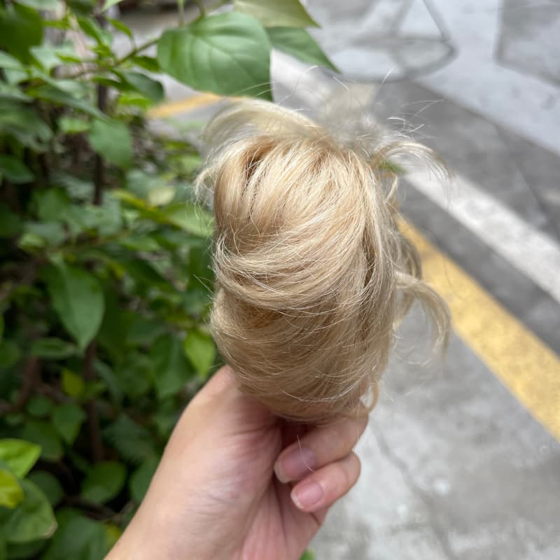 100% human hair bun scrunchie, color 16#, outdoor natural-light photo 2