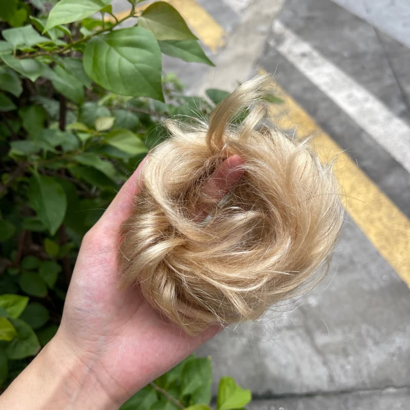 100% human hair bun scrunchie, color 16#, outdoor natural-light photo 3