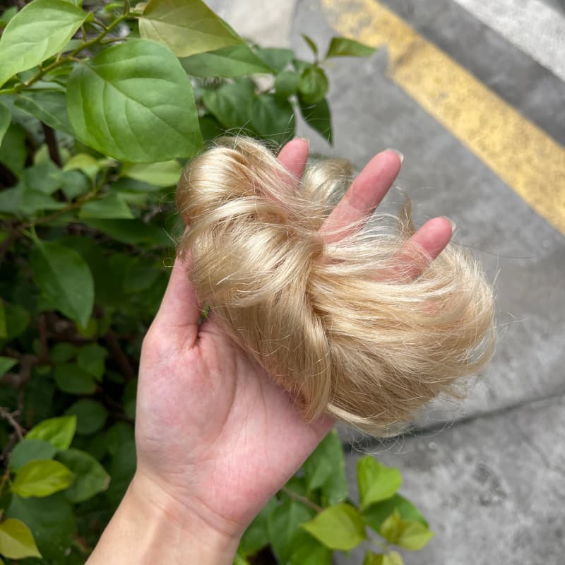 100% human hair bun scrunchie, color 16#, outdoor natural-light photo 4