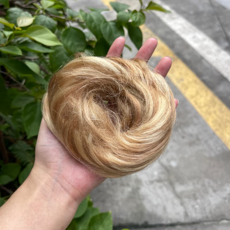 100% human hair bun scrunchie, color 18-613, outdoor natural-light photo 2