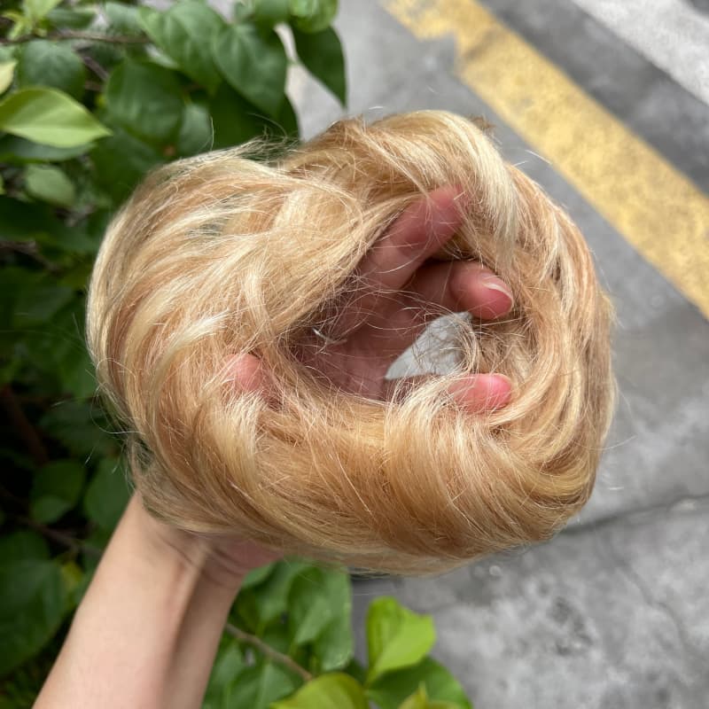 100% human hair bun scrunchie, color 18-613, outdoor natural-light photo 4