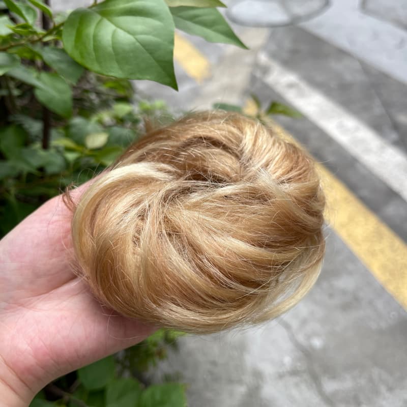 100% human hair bun scrunchie, color 18-613, outdoor natural-light photo 6
