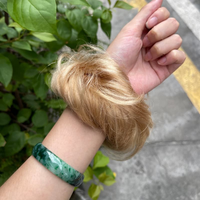 100% human hair bun scrunchie, color 19#, outdoor natural-light photo 6