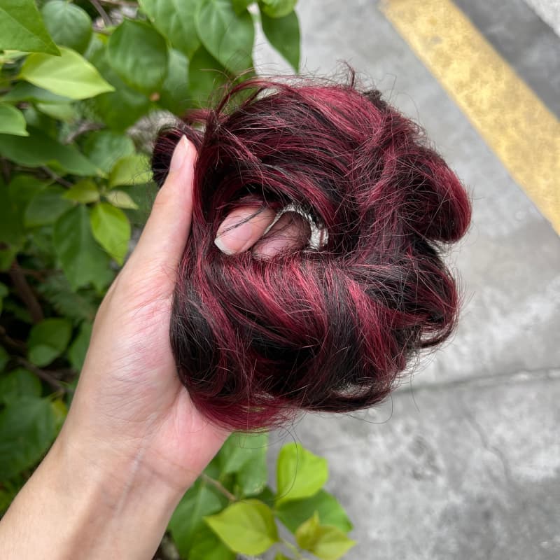 100% human hair bun scrunchie, color 1B99J, outdoor natural-light photo 3