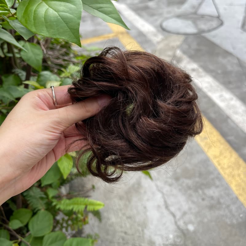 100% human hair bun scrunchie, color 2#, outdoor natural-light photo 4