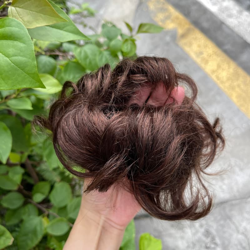 100% human hair bun scrunchie, color 2#, outdoor natural-light photo 5