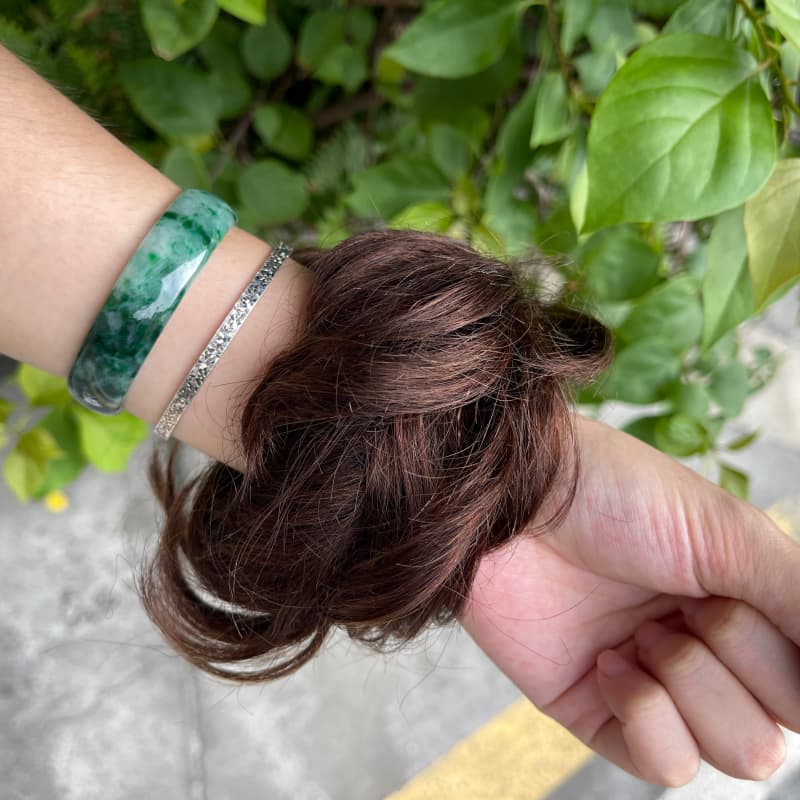 100% human hair bun scrunchie, color 2#, outdoor natural-light photo 6