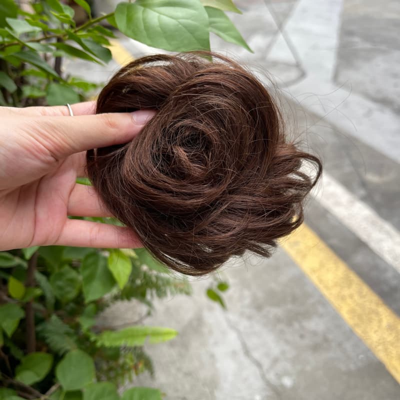 100% human hair bun scrunchie, color 4#, outdoor natural-light photo 2