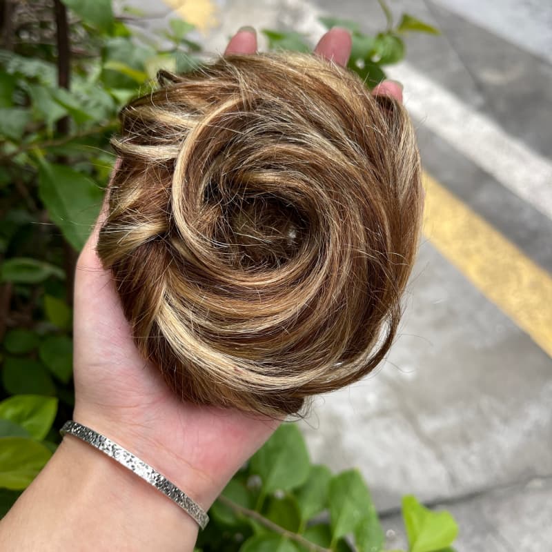 100% human hair bun scrunchie, color 4-27, outdoor natural-light photo 1