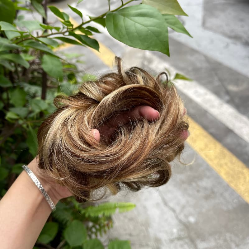 100% human hair bun scrunchie, color 4-27, outdoor natural-light photo 3