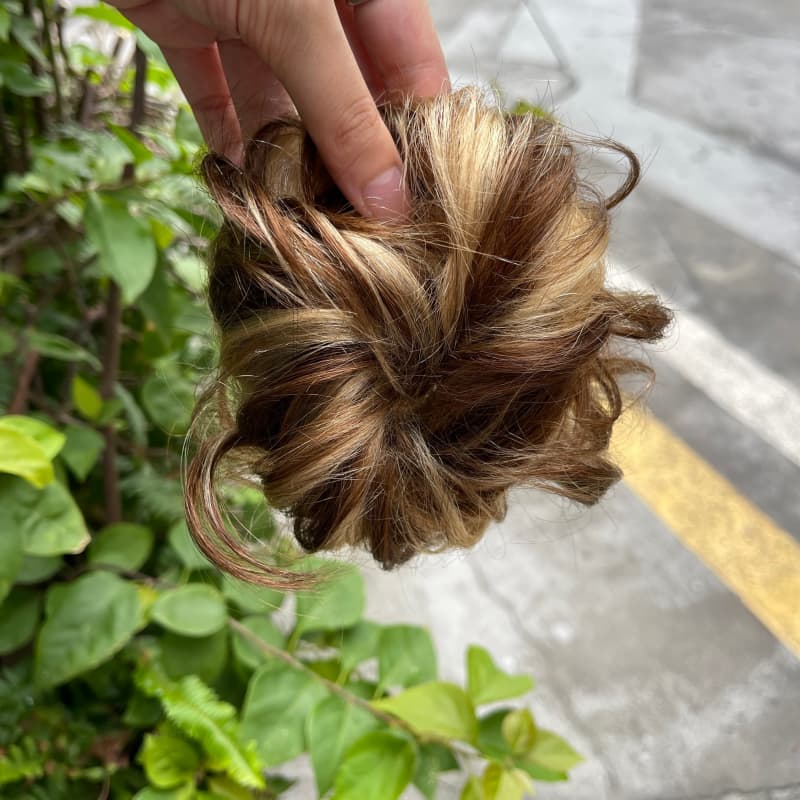 100% human hair bun scrunchie, color 4-27, outdoor natural-light photo 5