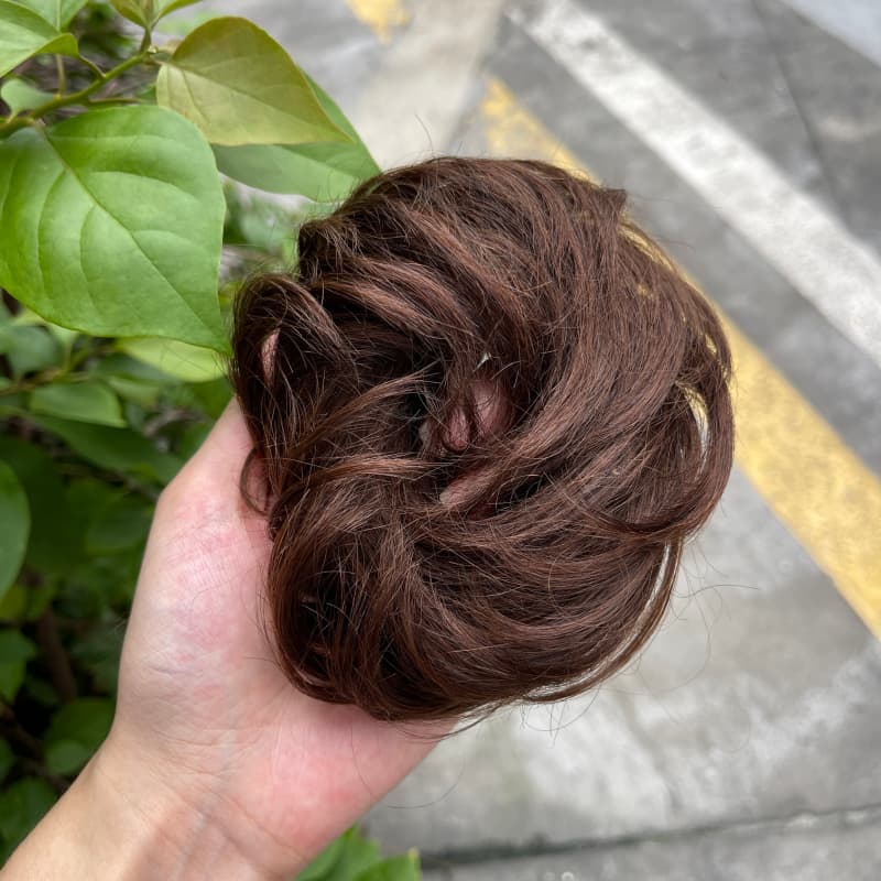 100% human hair bun scrunchie, color 4#, outdoor natural-light photo 4