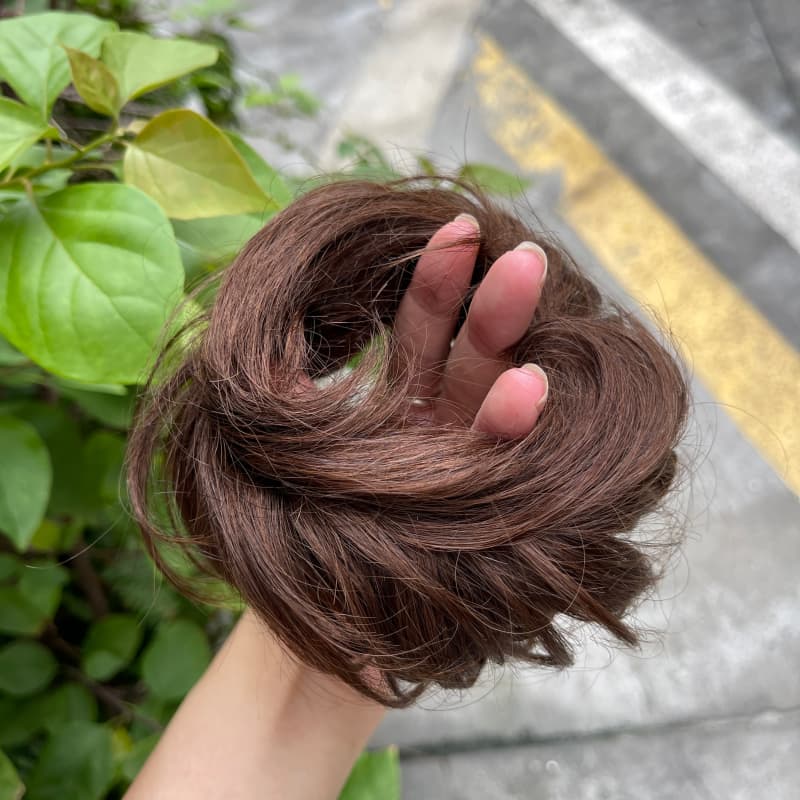 100% human hair bun scrunchie, color 4#, outdoor natural-light photo 5