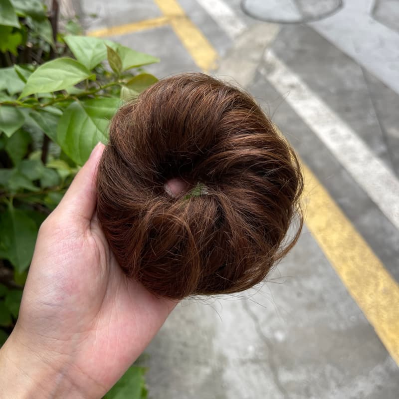 100% human hair bun scrunchie, color 4-6, outdoor natural-light photo 3