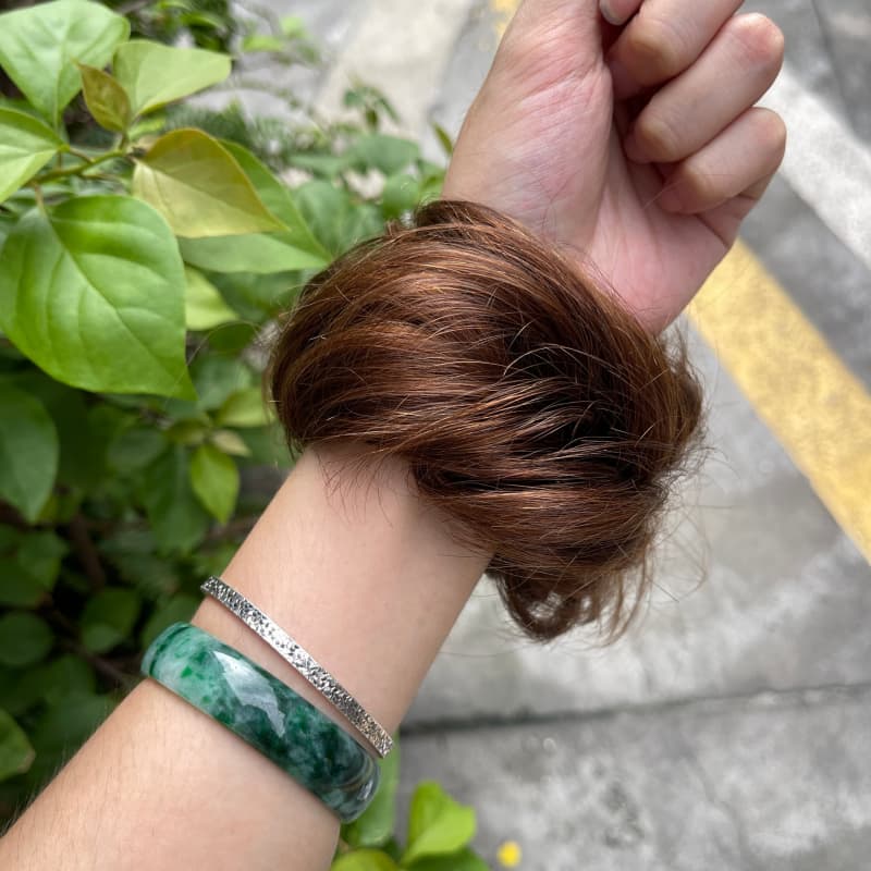 100% human hair bun scrunchie, color 4-6, outdoor natural-light photo 7