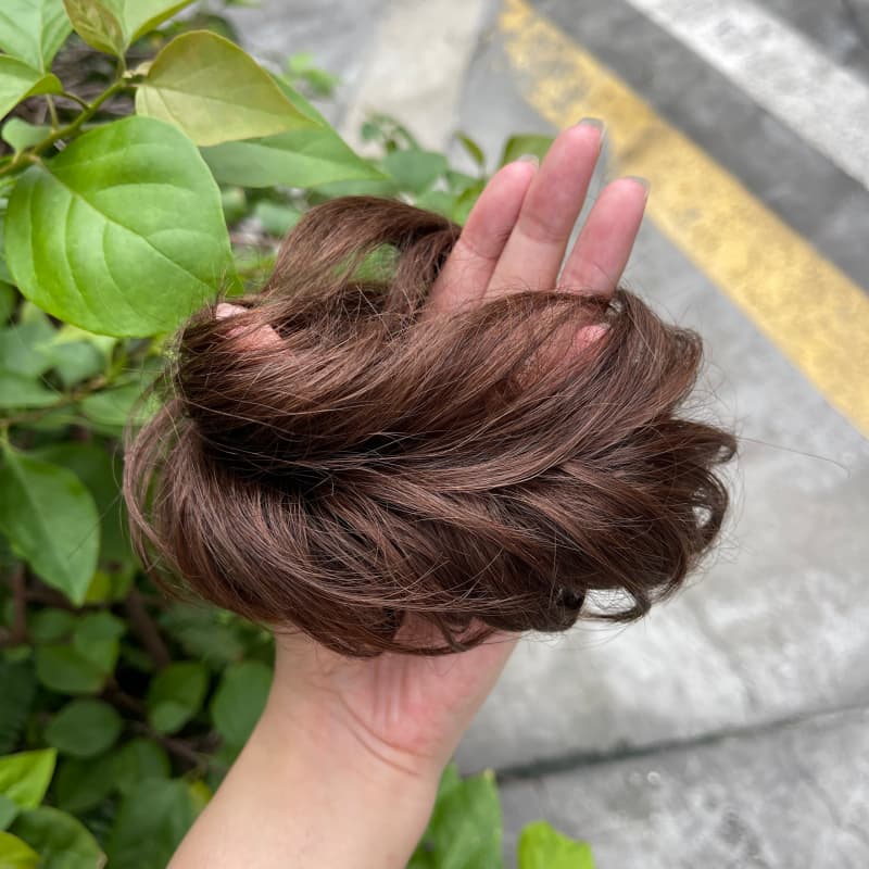 100% human hair bun scrunchie, color 4#, outdoor natural-light photo 6