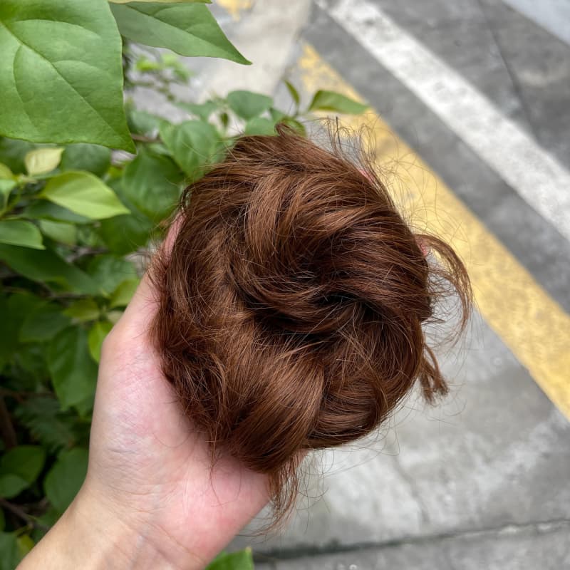 100% human hair bun scrunchie, color 6#, outdoor natural-light photo 1