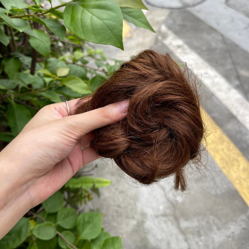 100% human hair bun scrunchie, color 6#, outdoor natural-light photo 2