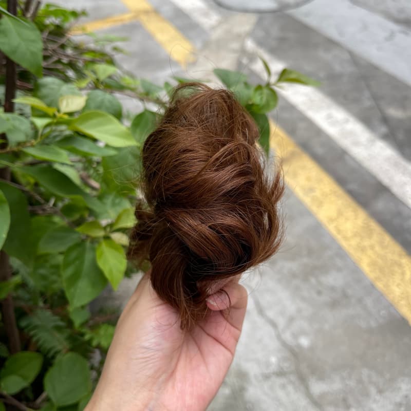 100% human hair bun scrunchie, color 6#, outdoor natural-light photo 3