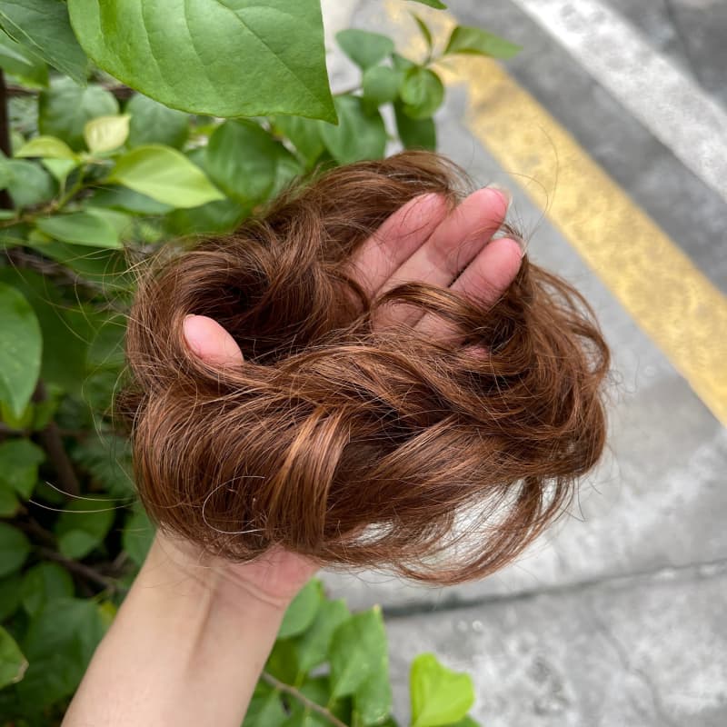 100% human hair bun scrunchie, color 6#, outdoor natural-light photo 4