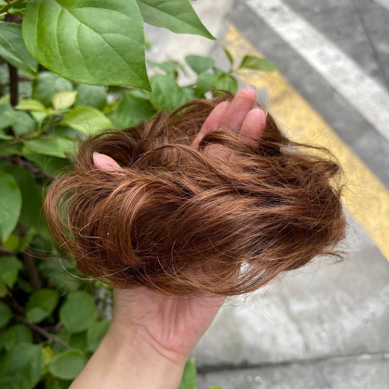 100% human hair bun scrunchie, color 6#, outdoor natural-light photo 5