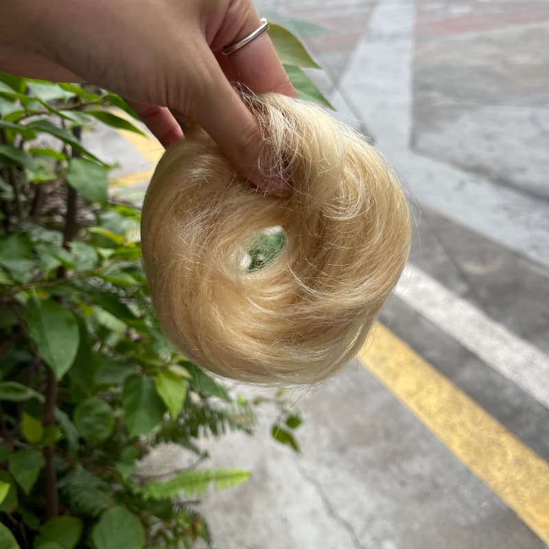 100% human hair bun scrunchie, color 613#, outdoor natural-light photo 3
