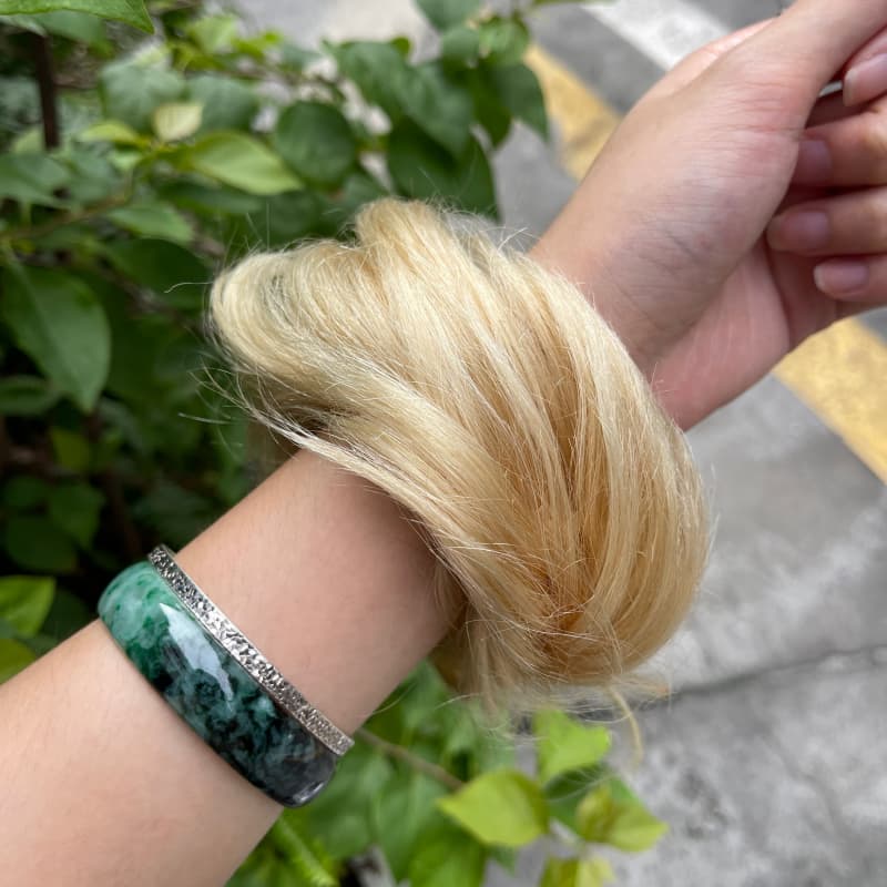 100% human hair bun scrunchie, color 613#, outdoor natural-light photo 6