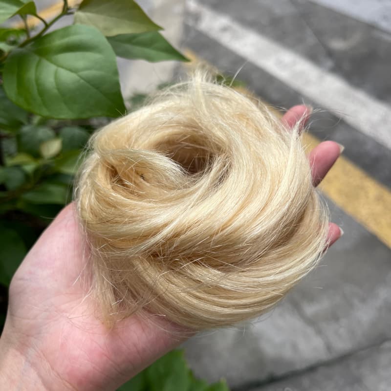 100% human hair bun scrunchie, color 613#, outdoor natural-light photo 7