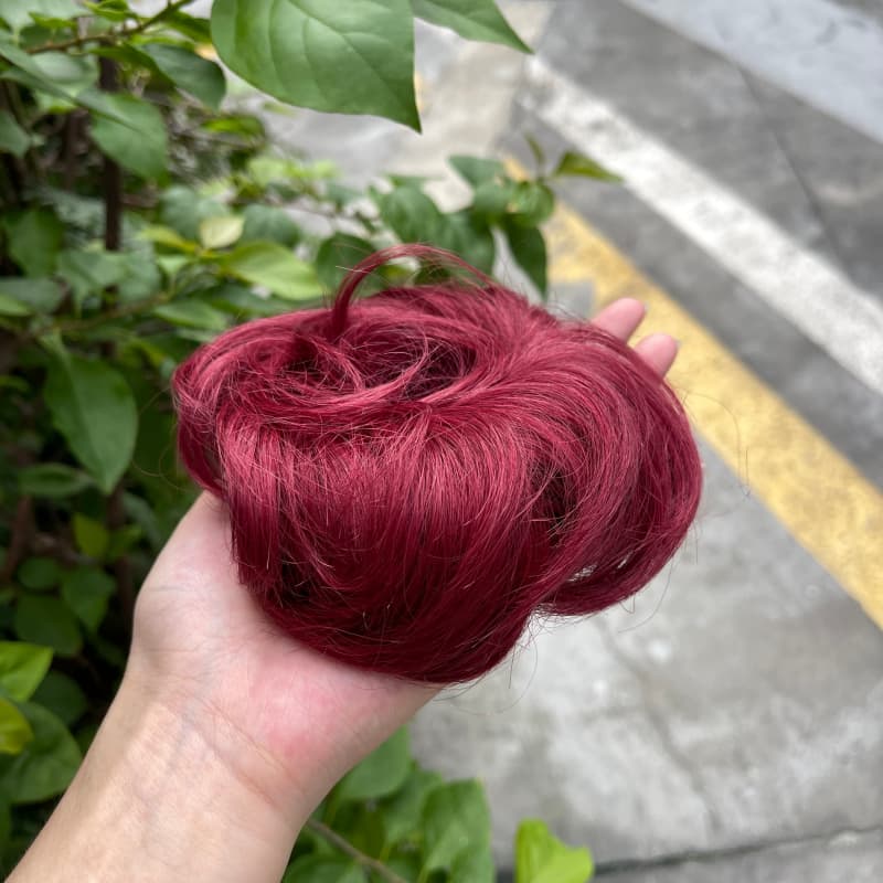 100% human hair bun scrunchie, color 99J#, outdoor natural-light photo 3