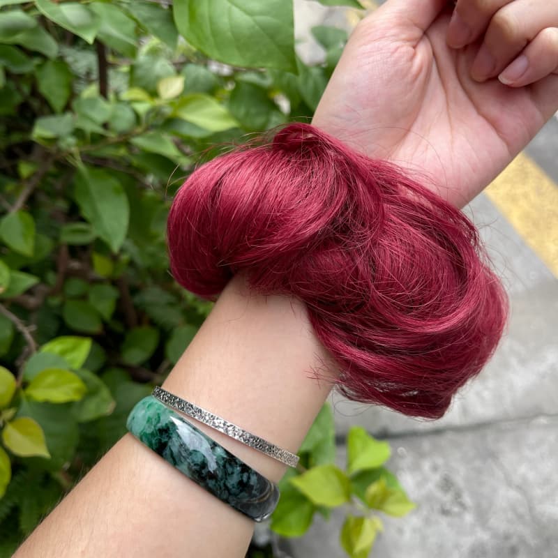 100% human hair bun scrunchie, color 99J#, outdoor natural-light photo 6