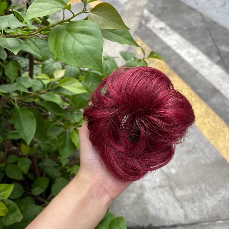 100% human hair bun scrunchie, color 99J#, outdoor natural-light photo 7