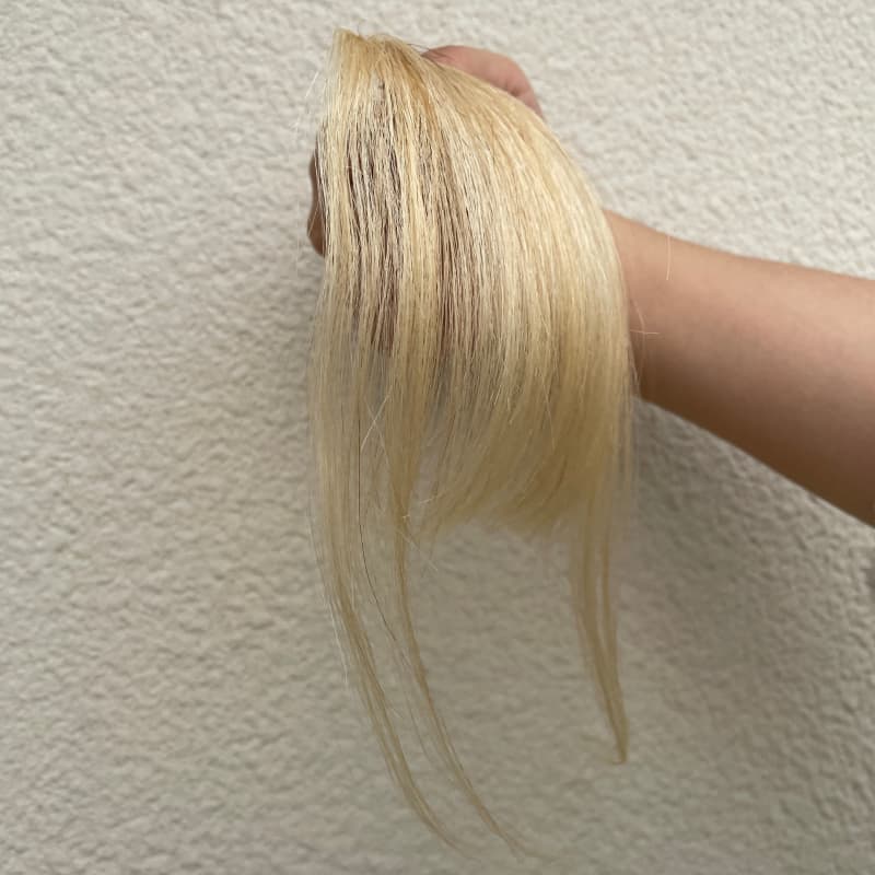 #613 blonde human hair clip-in bangs with longer face-framing sides