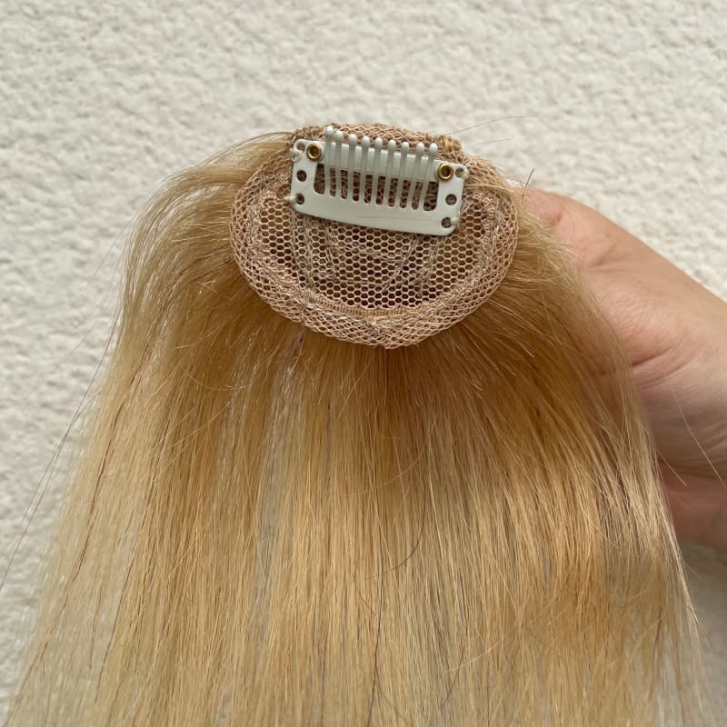 Ash blonde fringe hairpiece compact mesh base and single clip detail