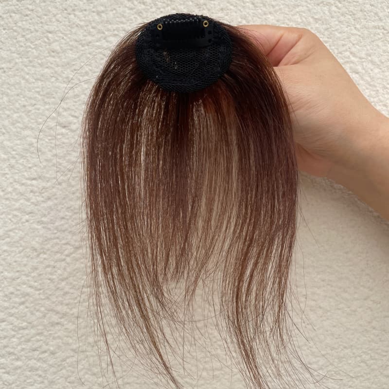 Dark brown fringe hairpiece compact mesh base and single clip detail