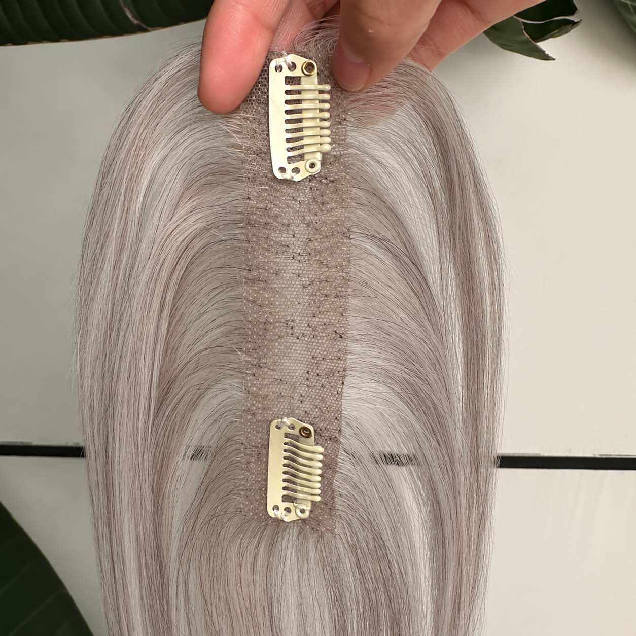 Gray human hair topper 2 by 12 cm lace base and two clips detail