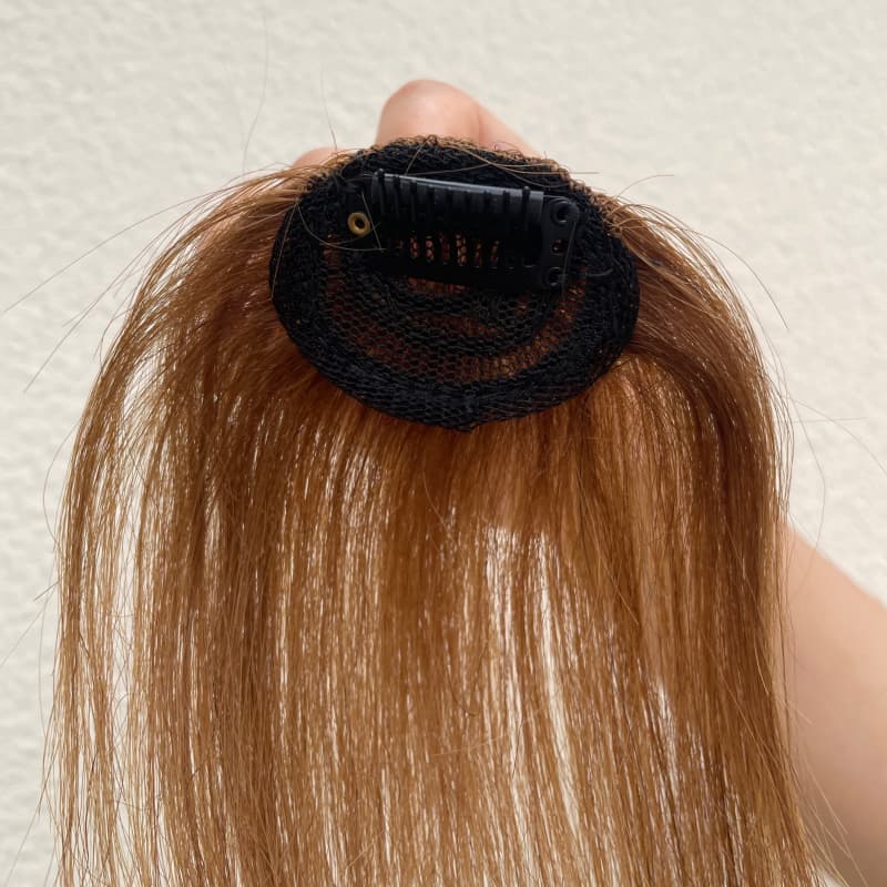 Medium brown clip-in fringe compact base and single clip detail