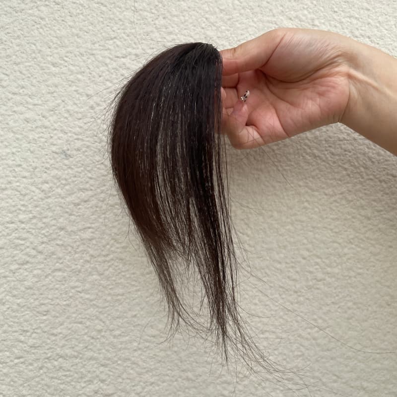 Natural black human hair clip-in bangs with face-framing side strands